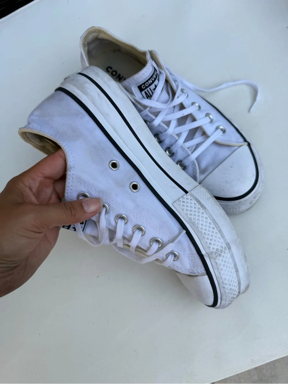 Converse women’s platform White Low Top Sneakers